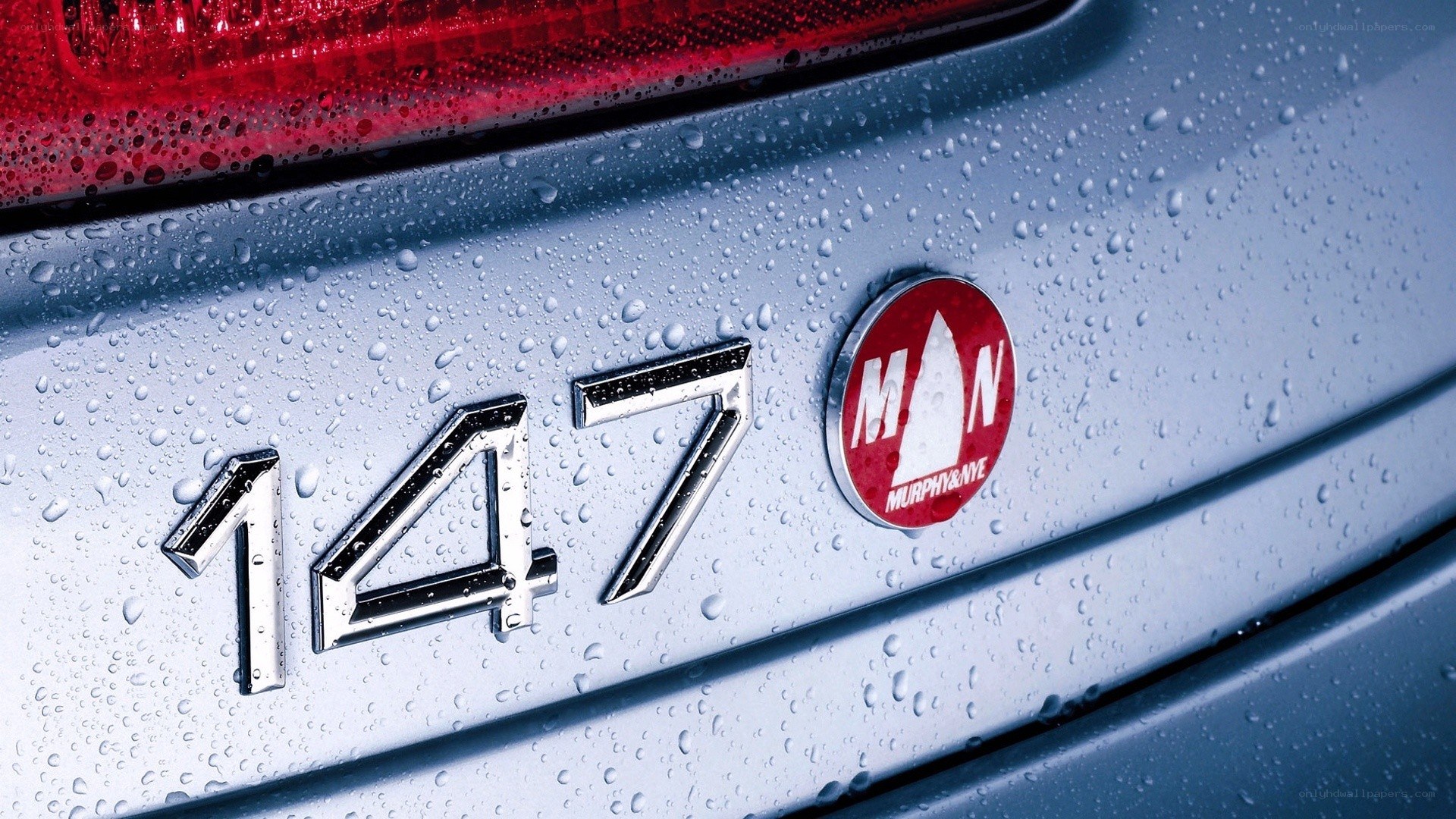 car badge with water droplets