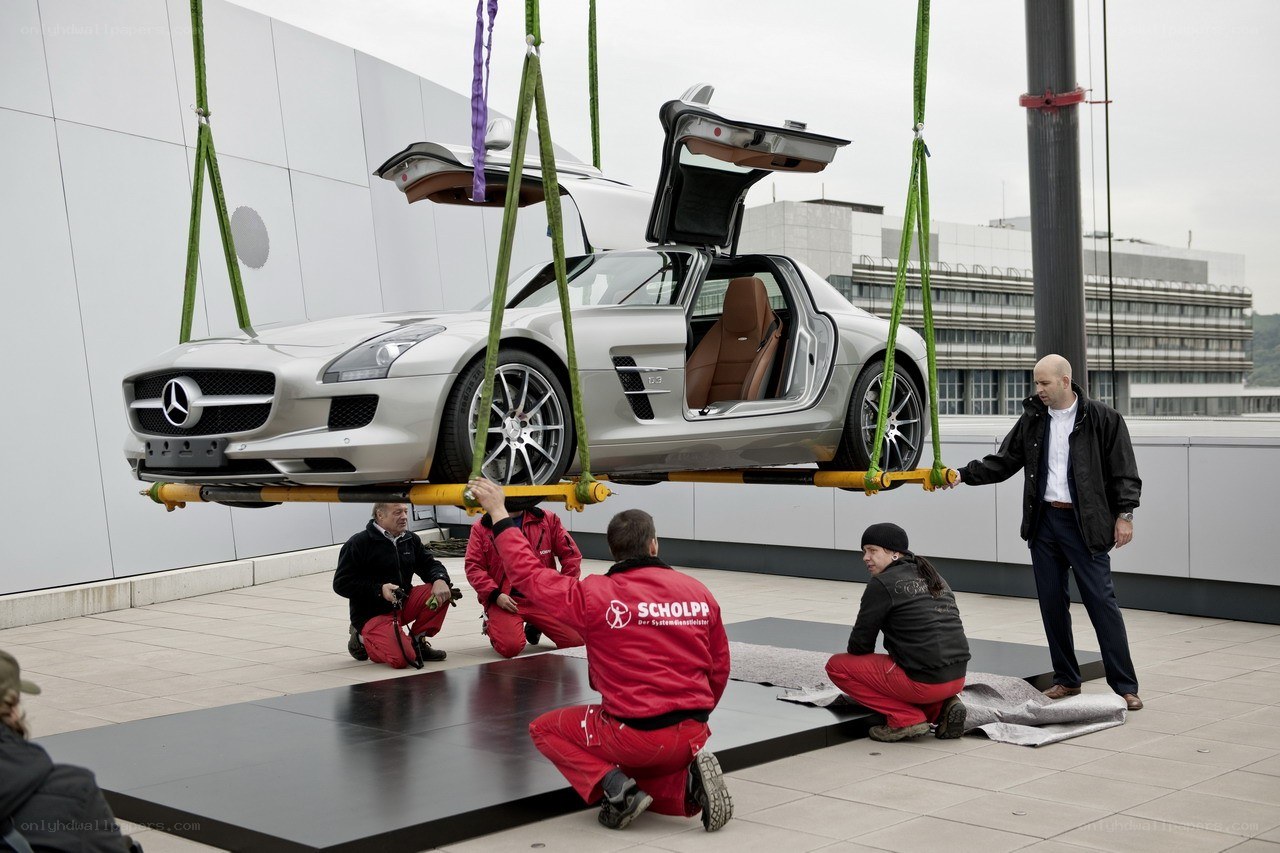 Car being lifted on a platform