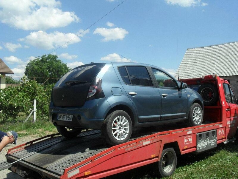 Car being transported on a tow truck