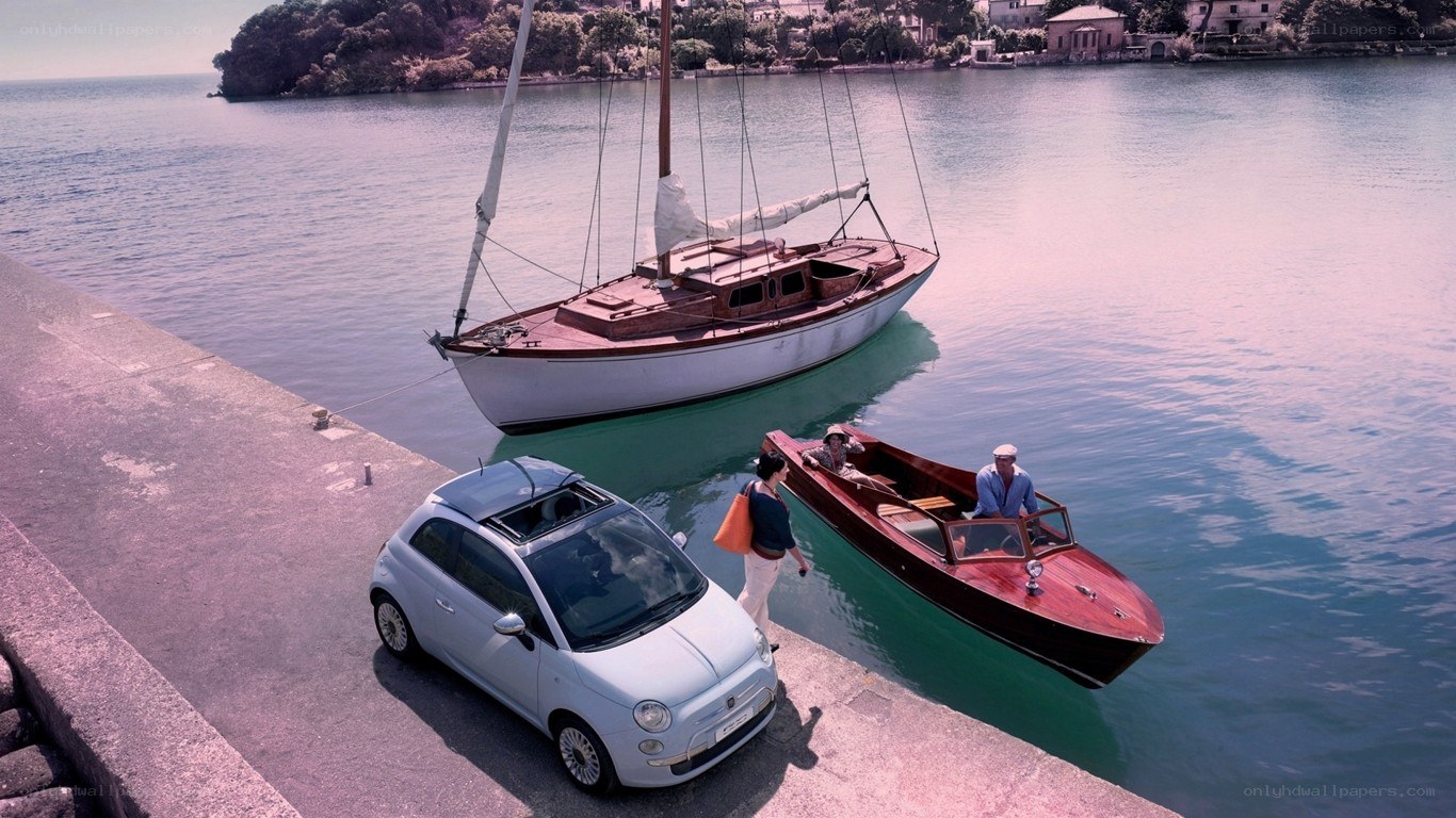 Car by the dock with boats
