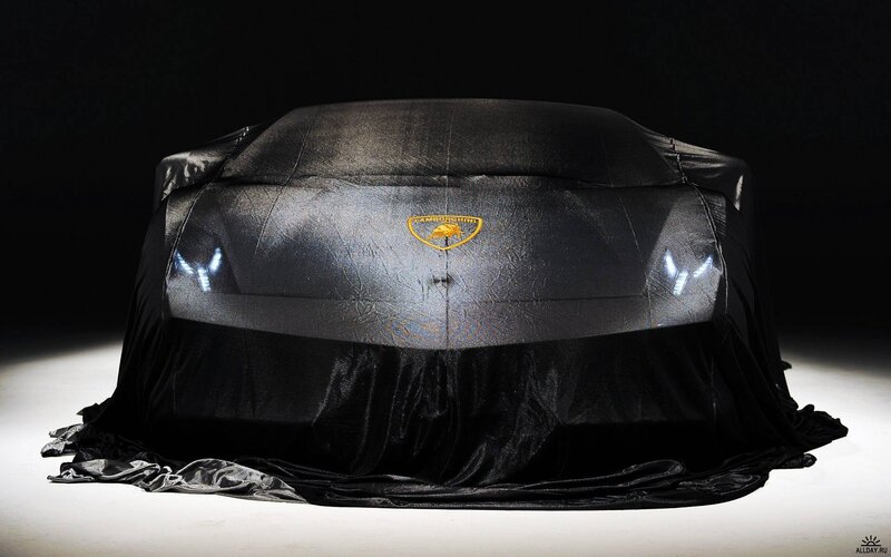 Car Covered in Black Cloth
