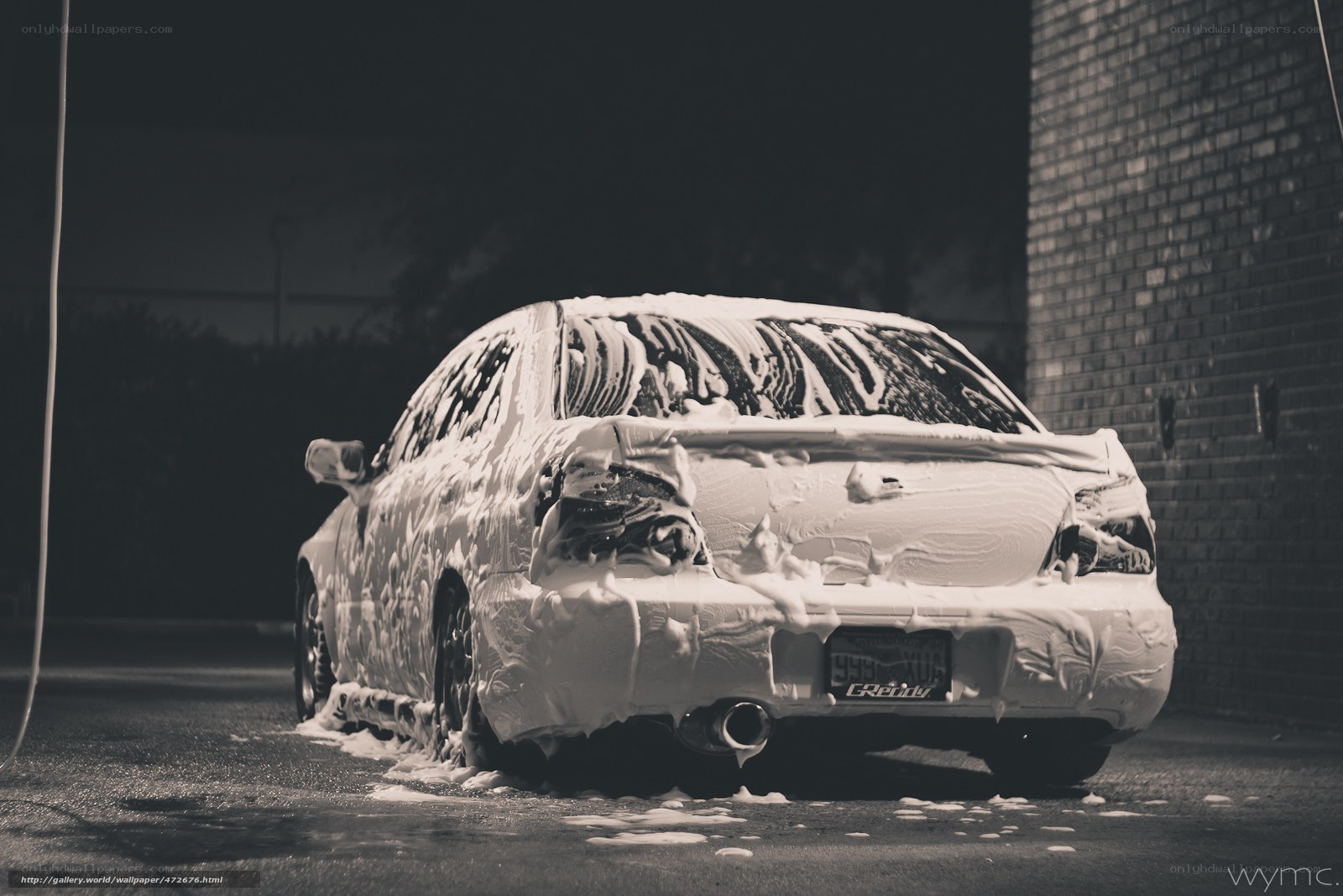 car covered in soap suds