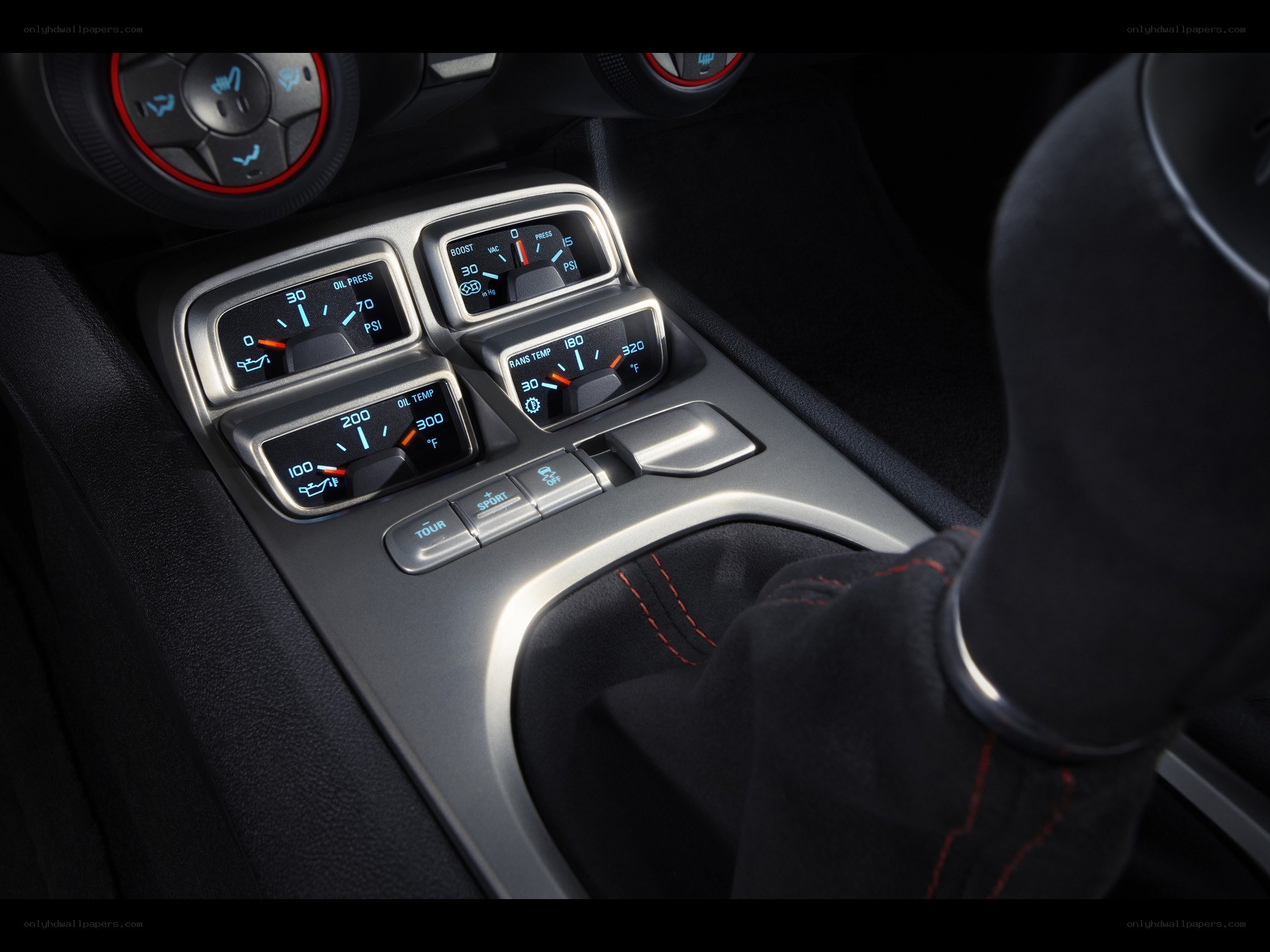 car dashboard gauges and shifter