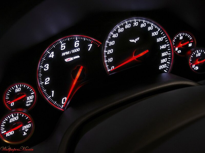 car dashboard gauges at night