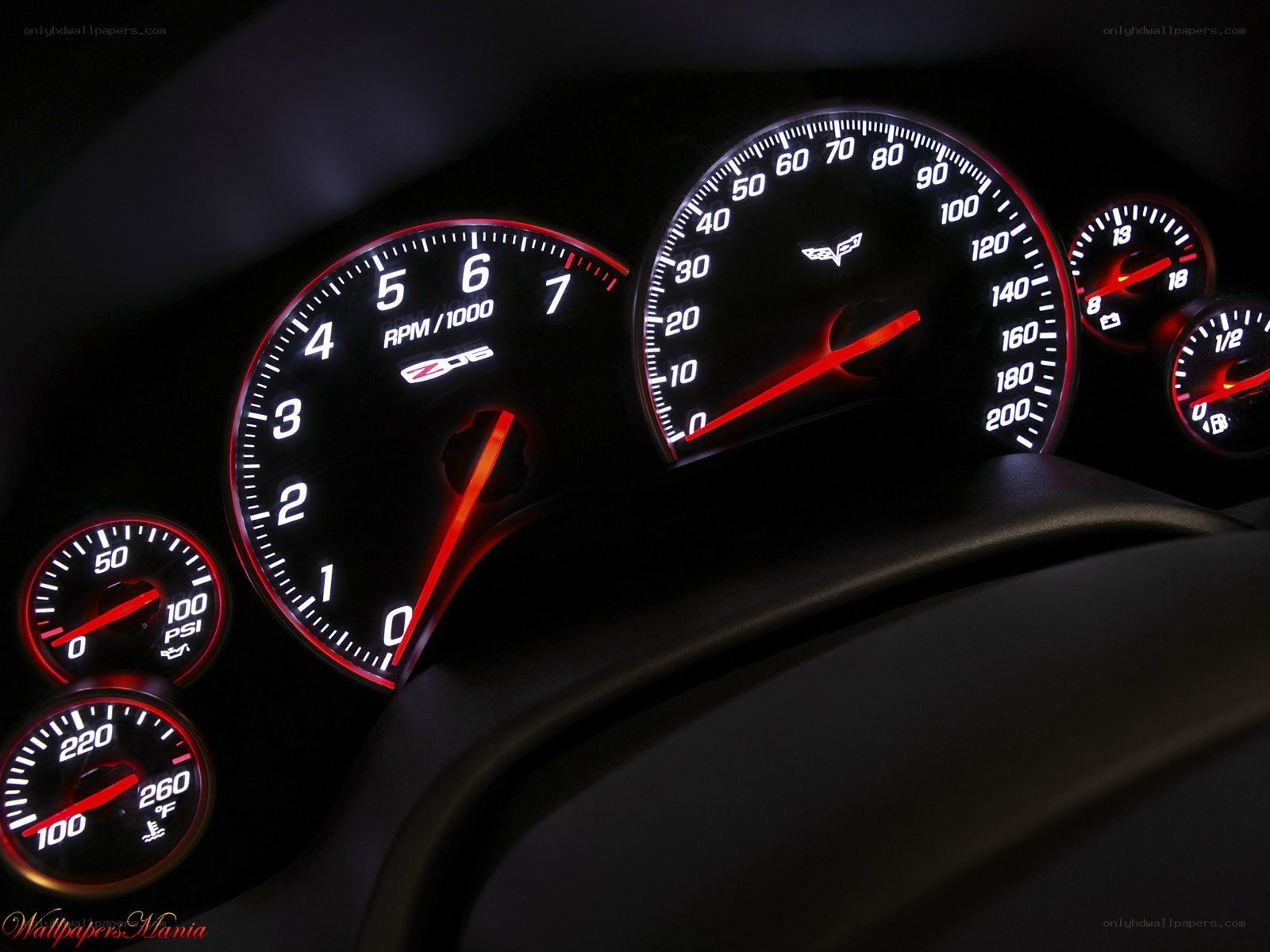 car dashboard gauges at night