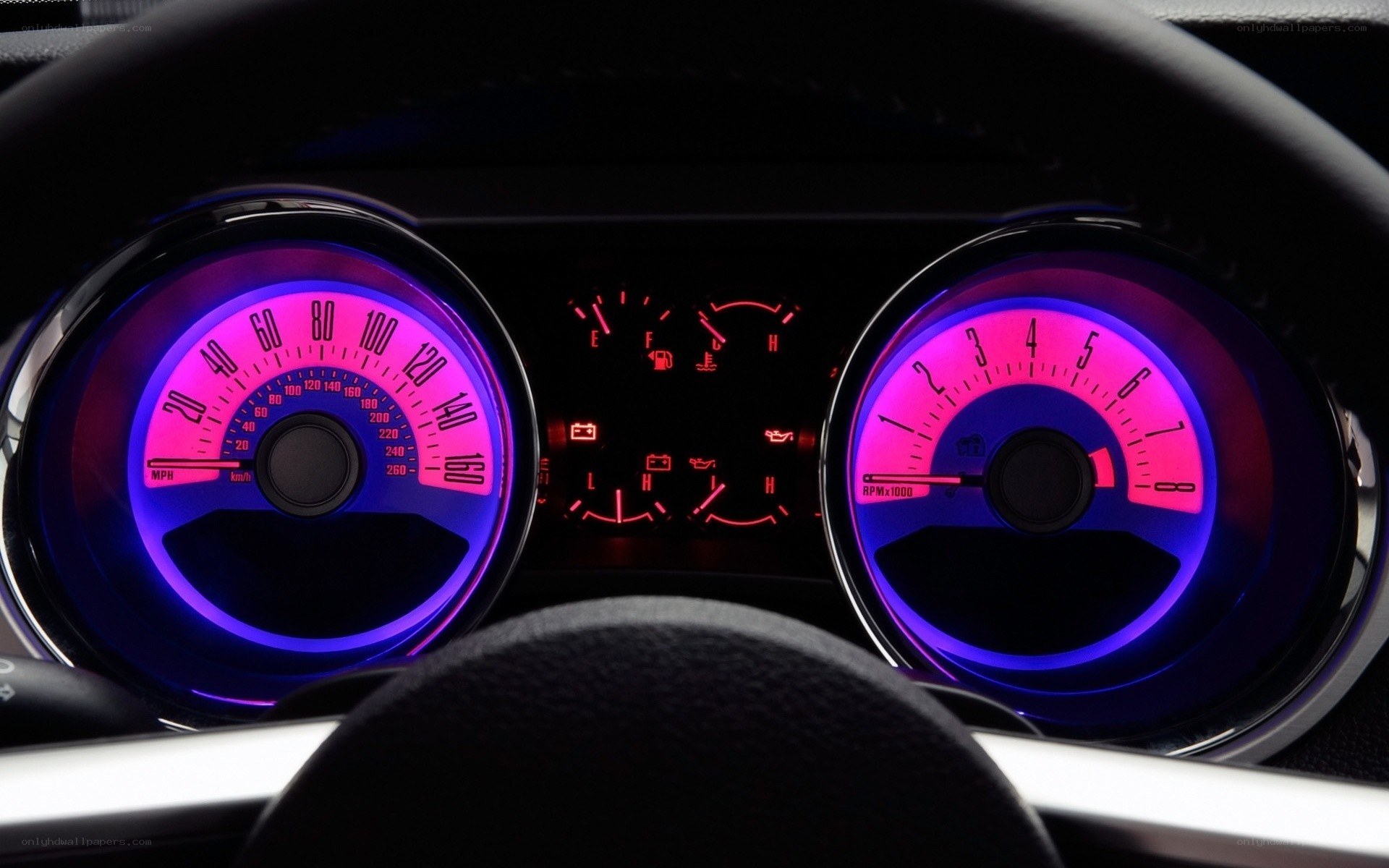 car dashboard with glowing gauges