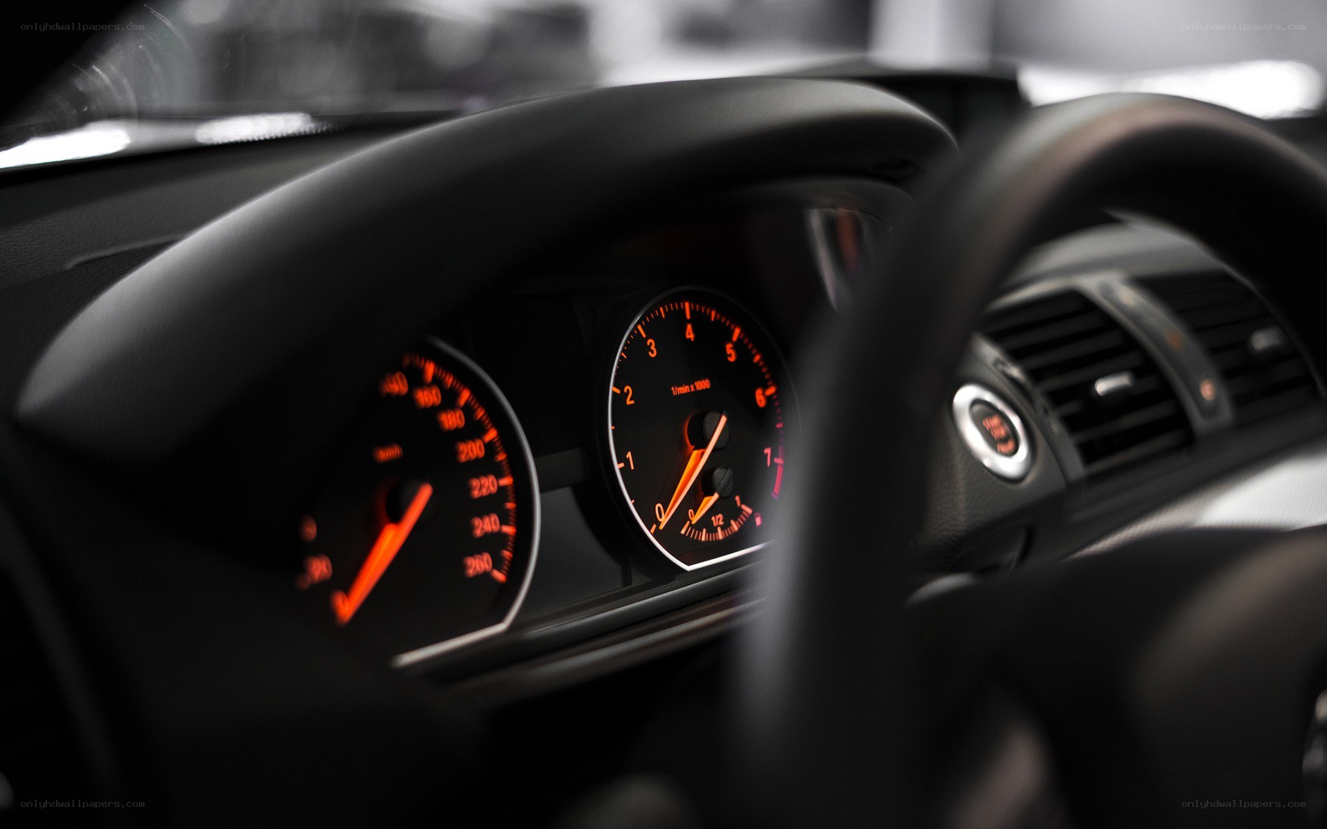 car dashboard with illuminated gauges