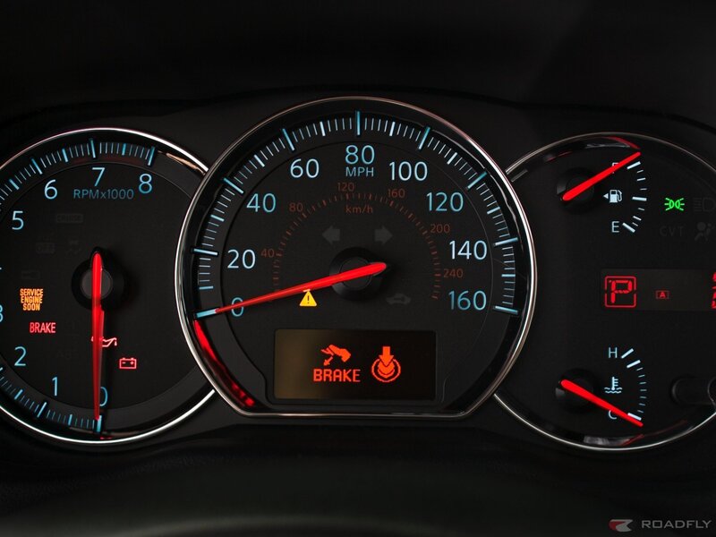 car dashboard with warning lights