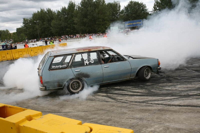 car drifting at a race