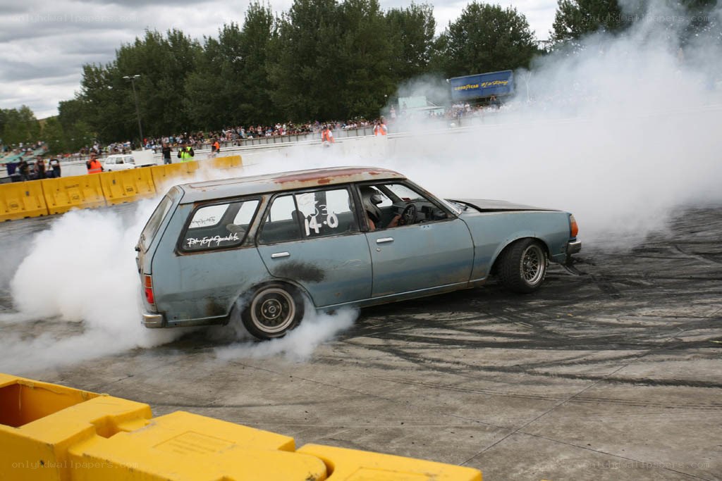 car drifting at a race