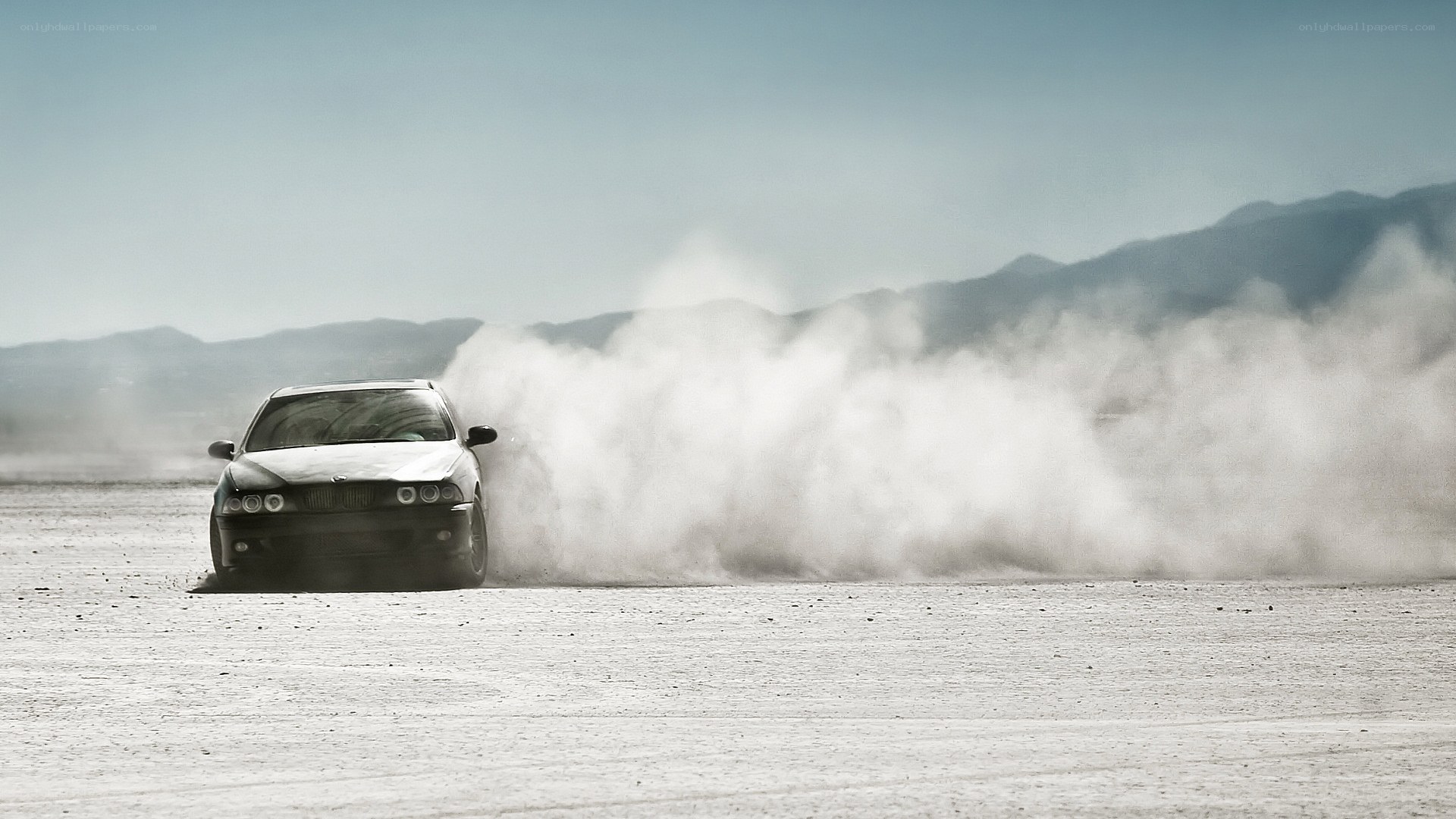 car drifting in desert
