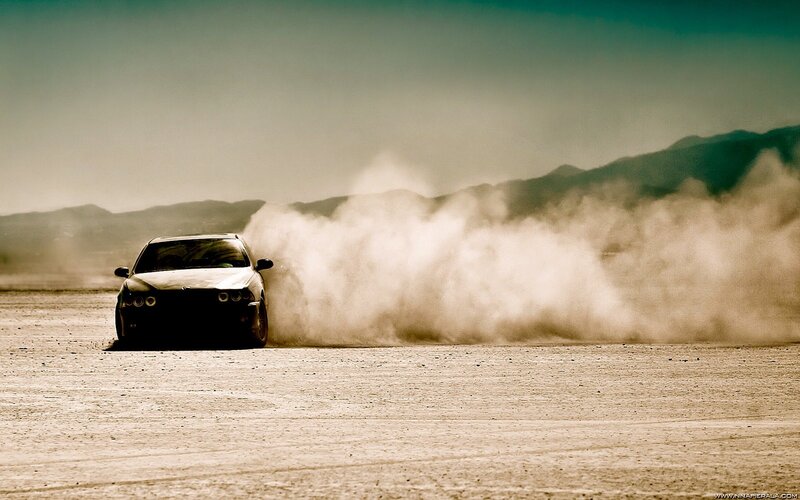 Car Drifting in Desert — Brown