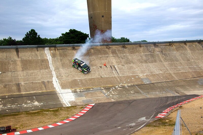 Car drifting on a concrete wall