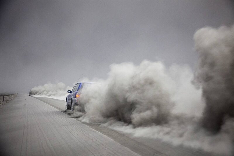 car drifting on desert road