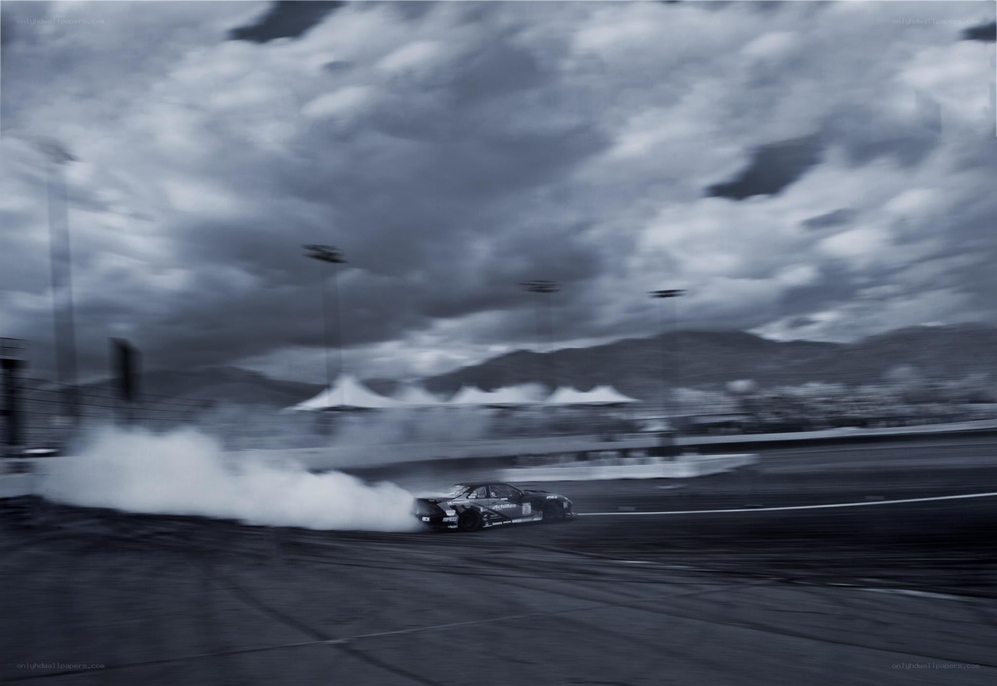 Car drifting on racetrack