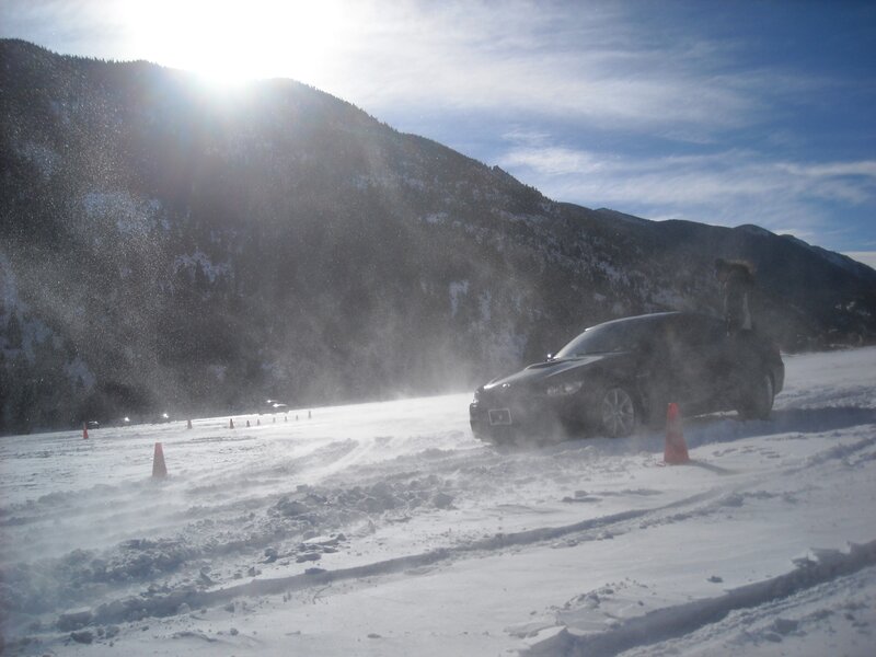 Car drifting on snowy mountain