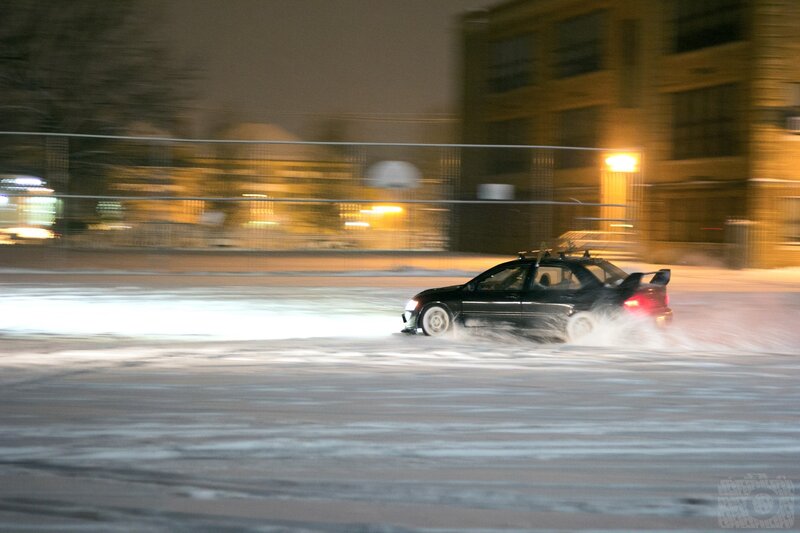 Car drifting on snowy street