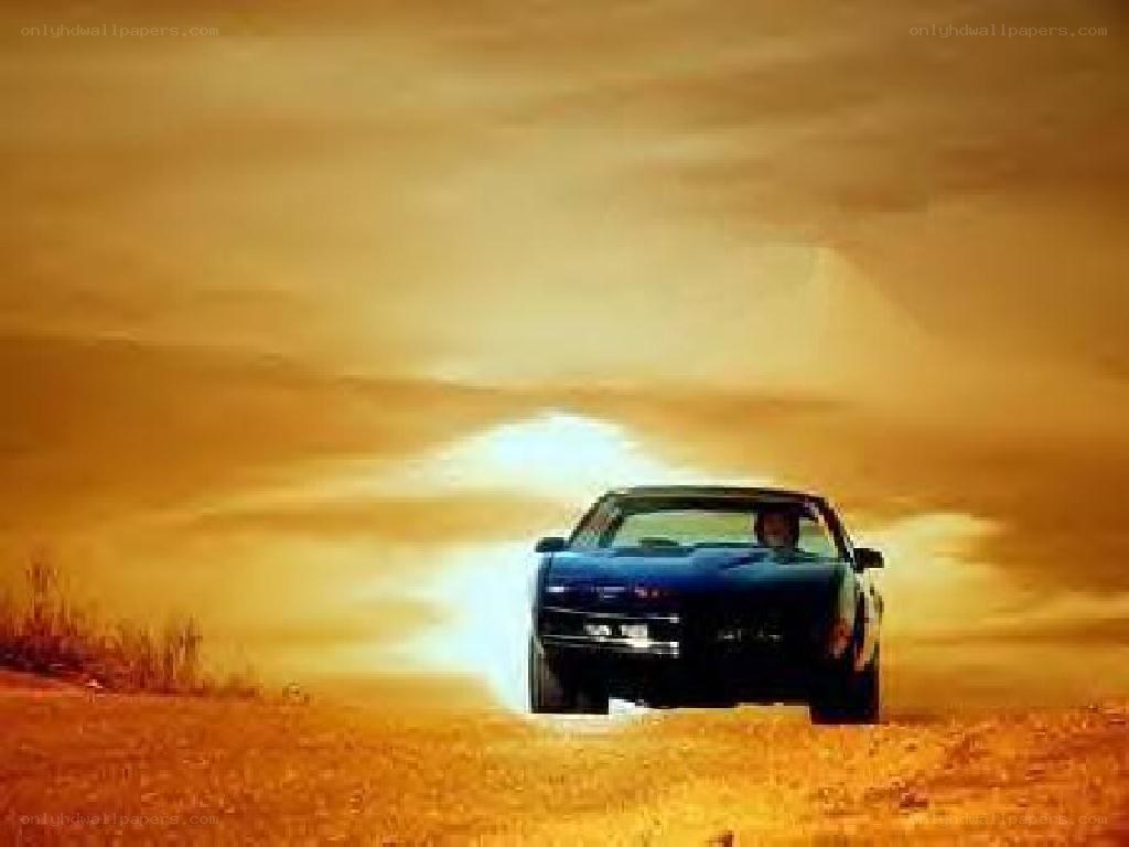 car driving at sunset