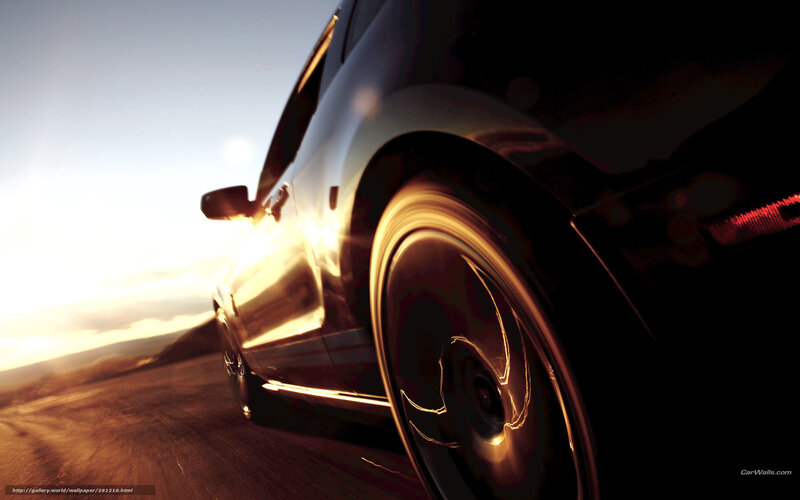 car driving at sunset