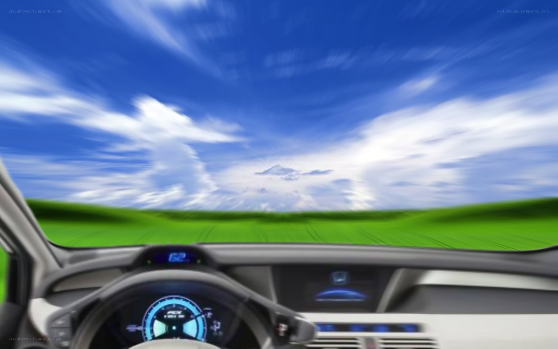 car driving fast on green field