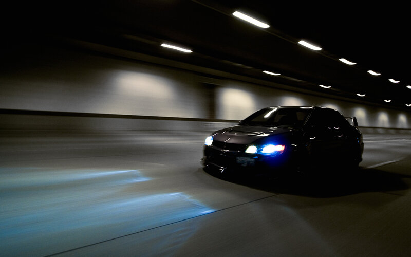 Car driving in a tunnel