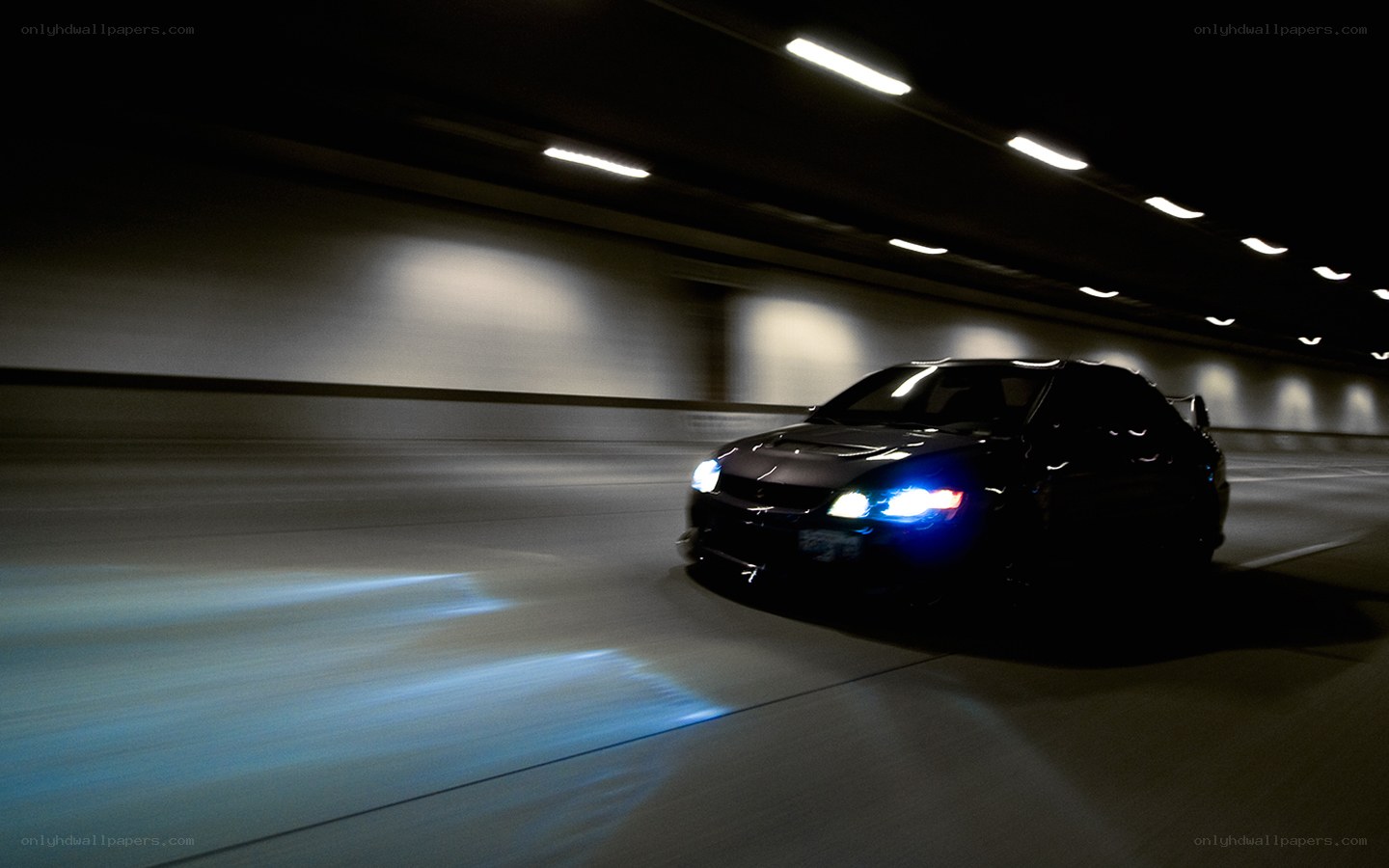 Car driving in a tunnel