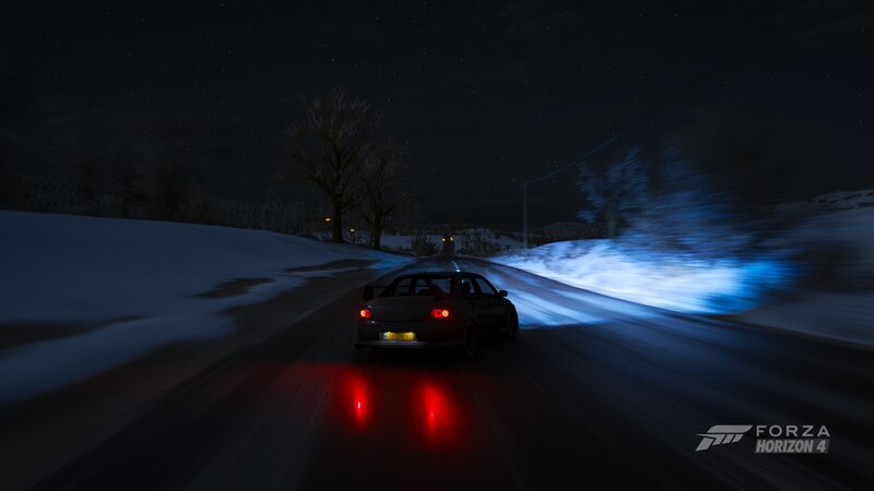 Car Driving on Snowy Road — Black