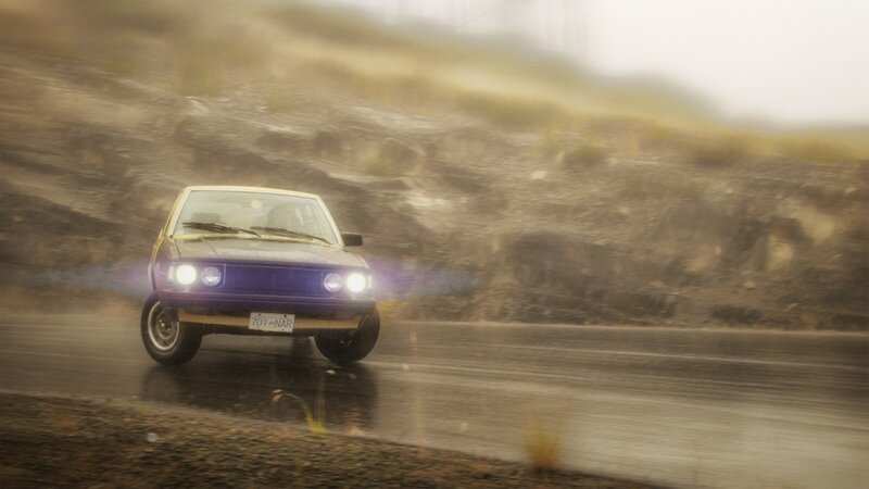 car driving on wet road