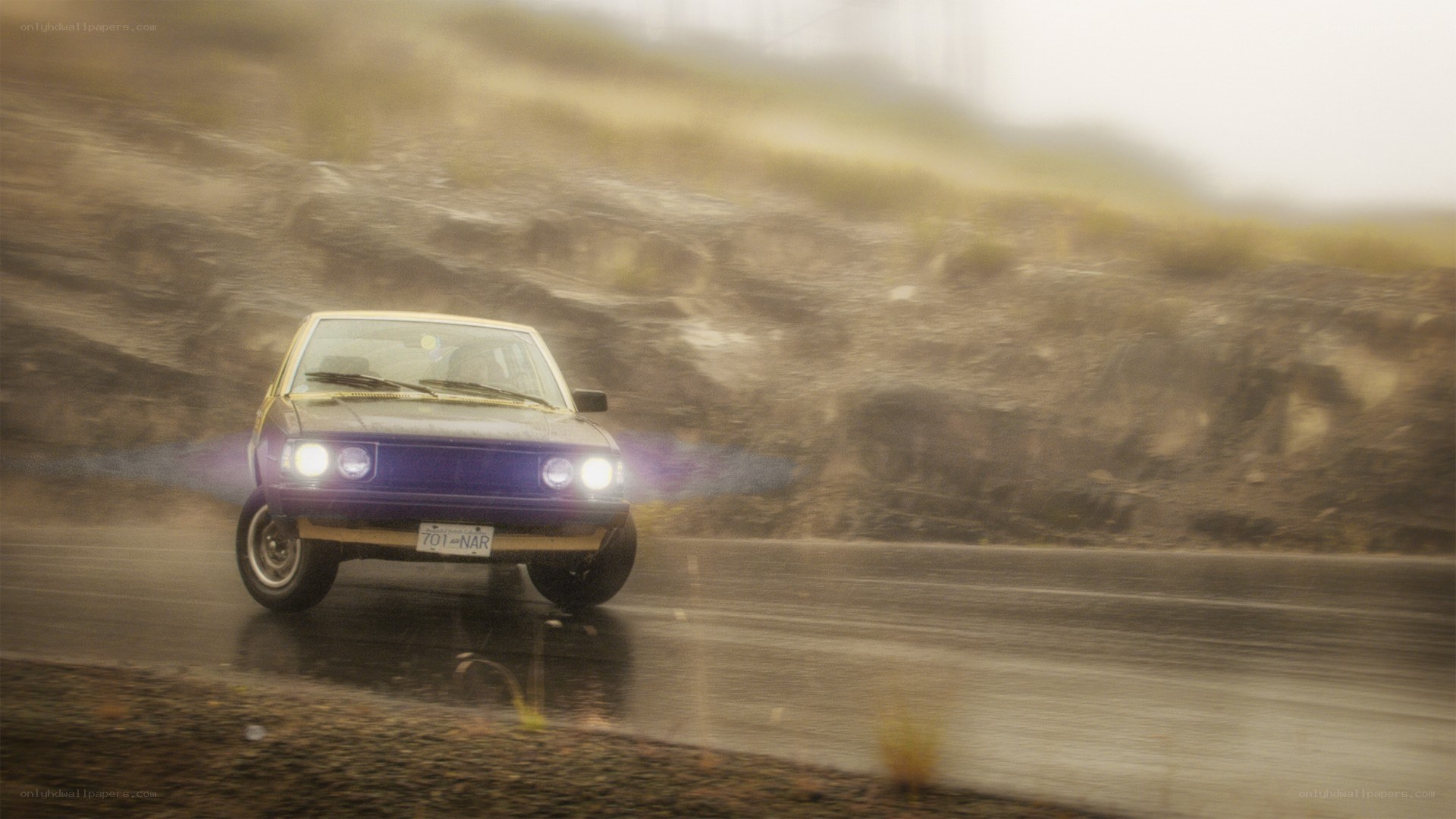 car driving on wet road
