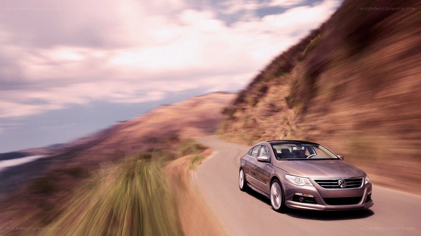 Car driving on winding road