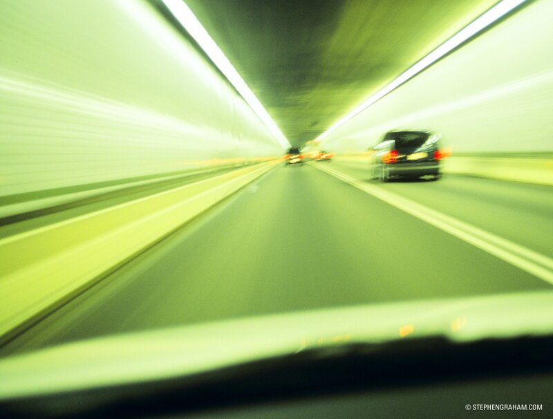 car driving through tunnel