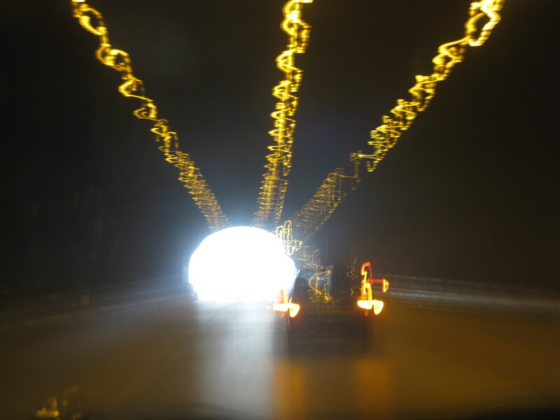 Car Driving Through Tunnel — Yellow