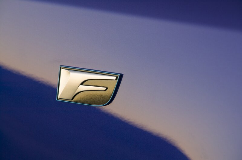 car emblem on blue surface