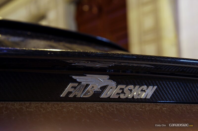 Car Emblem on Carbon Fiber — Black