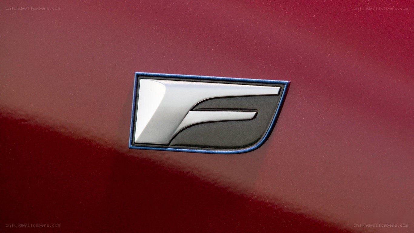 car emblem on red surface