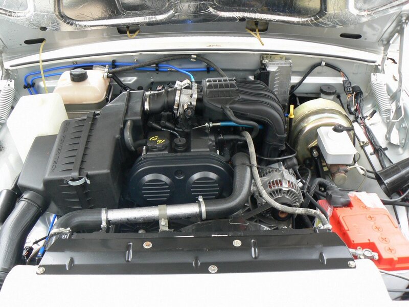 Car Engine Bay — Black, Neutral, Photograph, Battery, Air Filter
