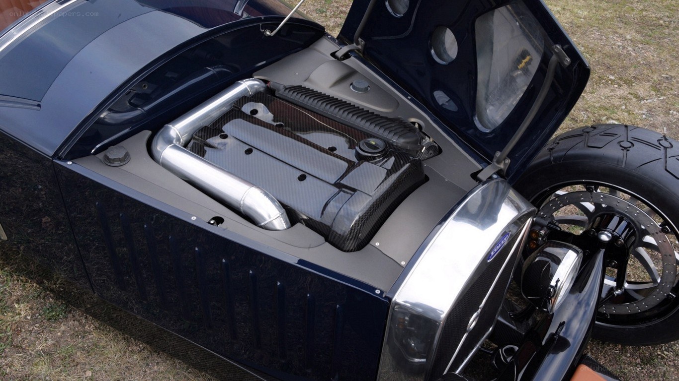 car engine bay with carbon fiber