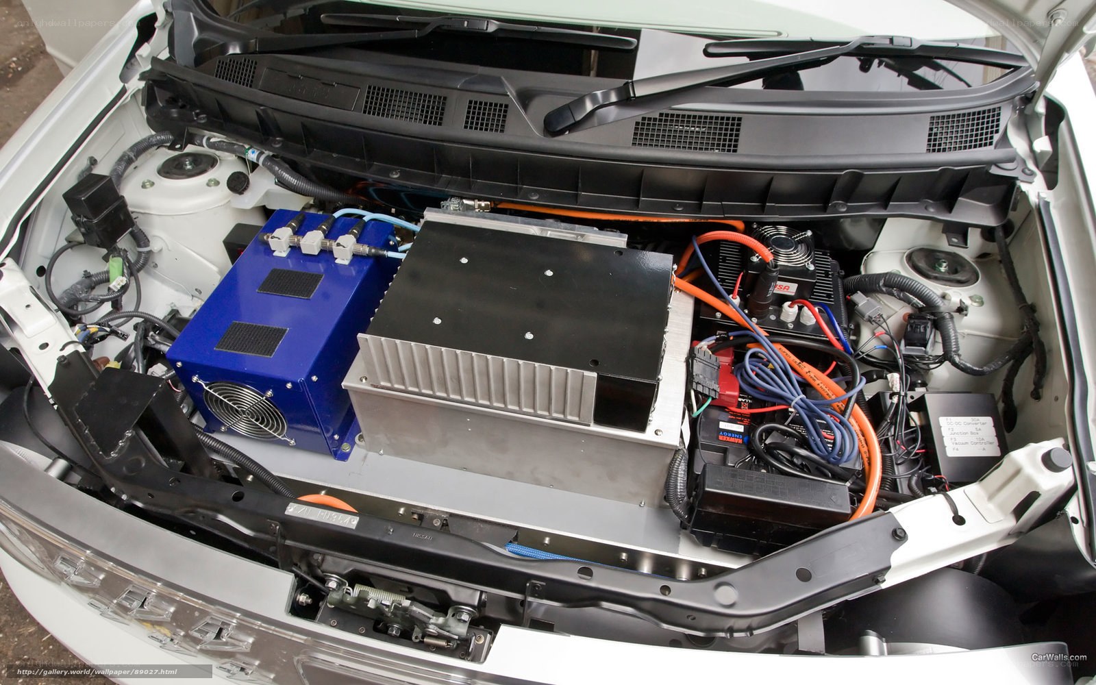Car engine bay with electric components