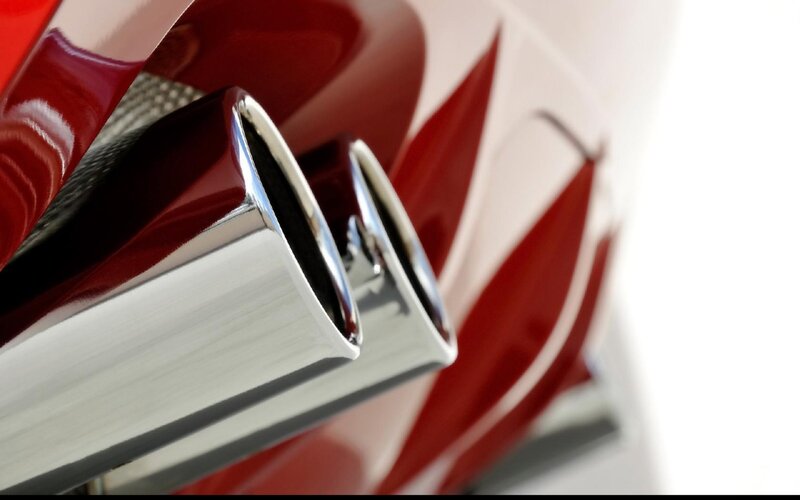 Car Exhaust Pipes — Red, Dramatic, Photograph