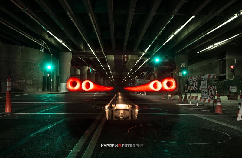 Car Exhaust under Bridge