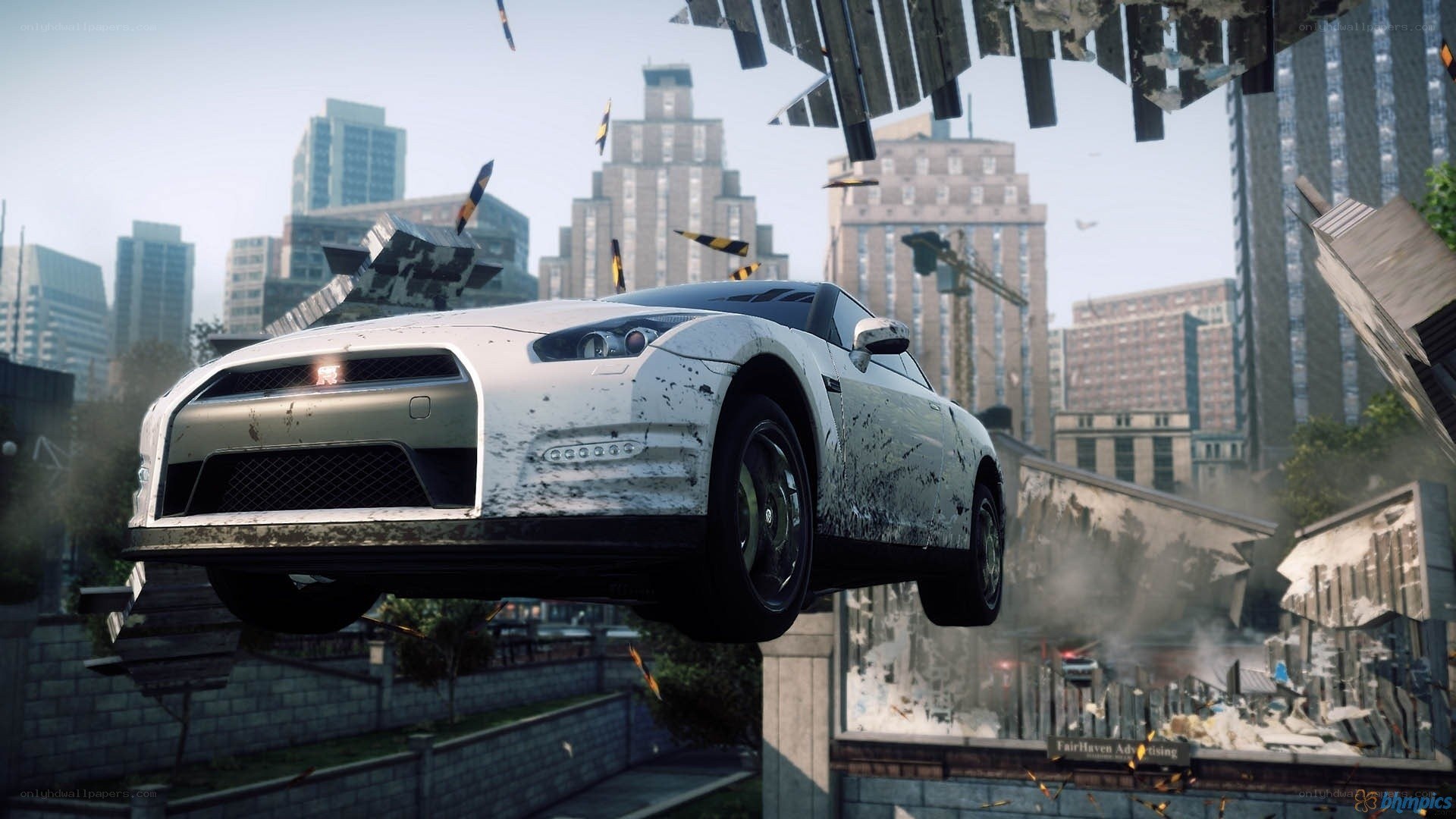 car flying over city debris