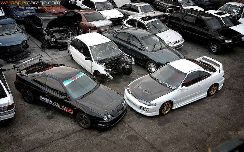 Car graveyard with damaged vehicles