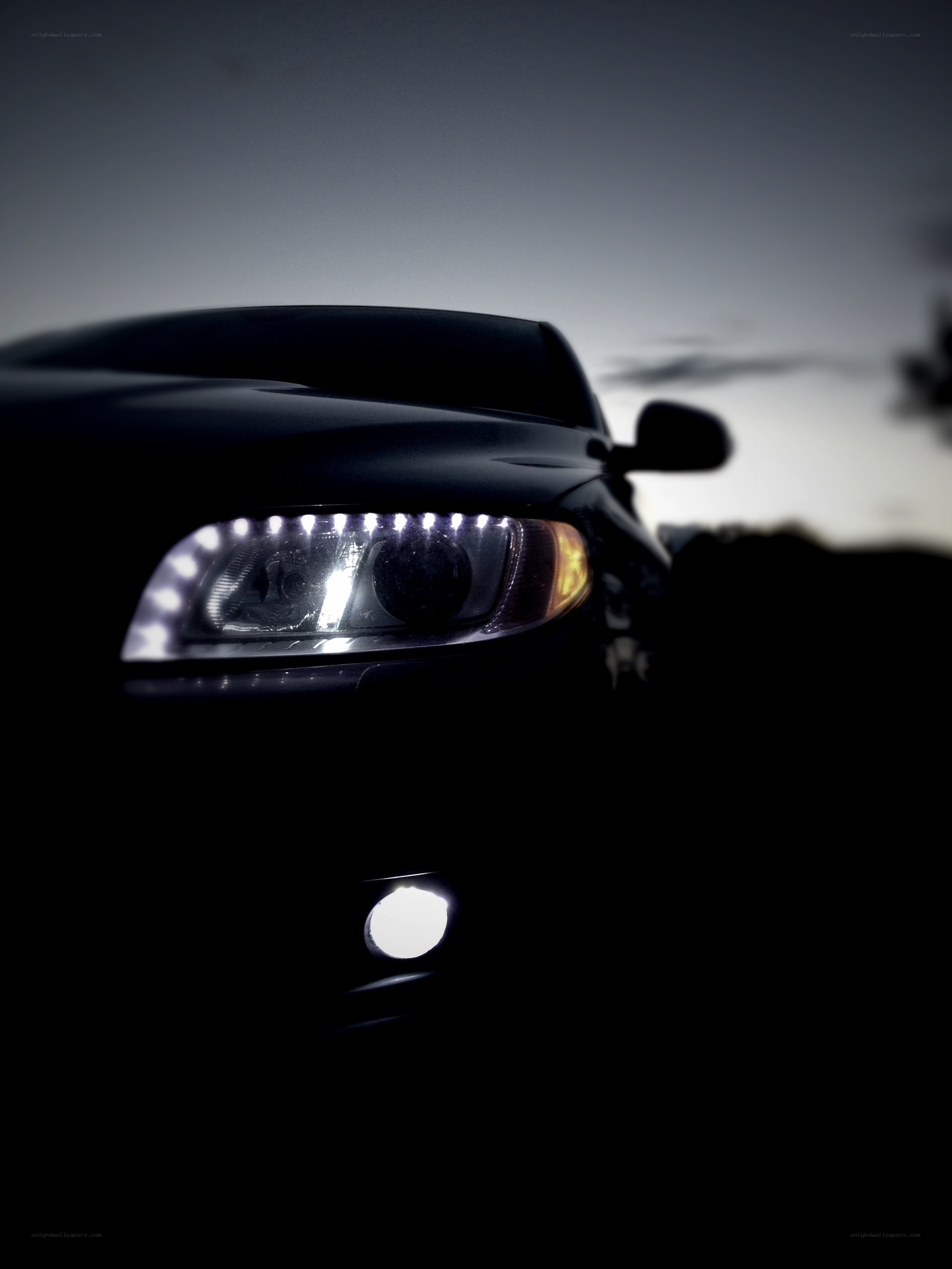 car headlights at dusk