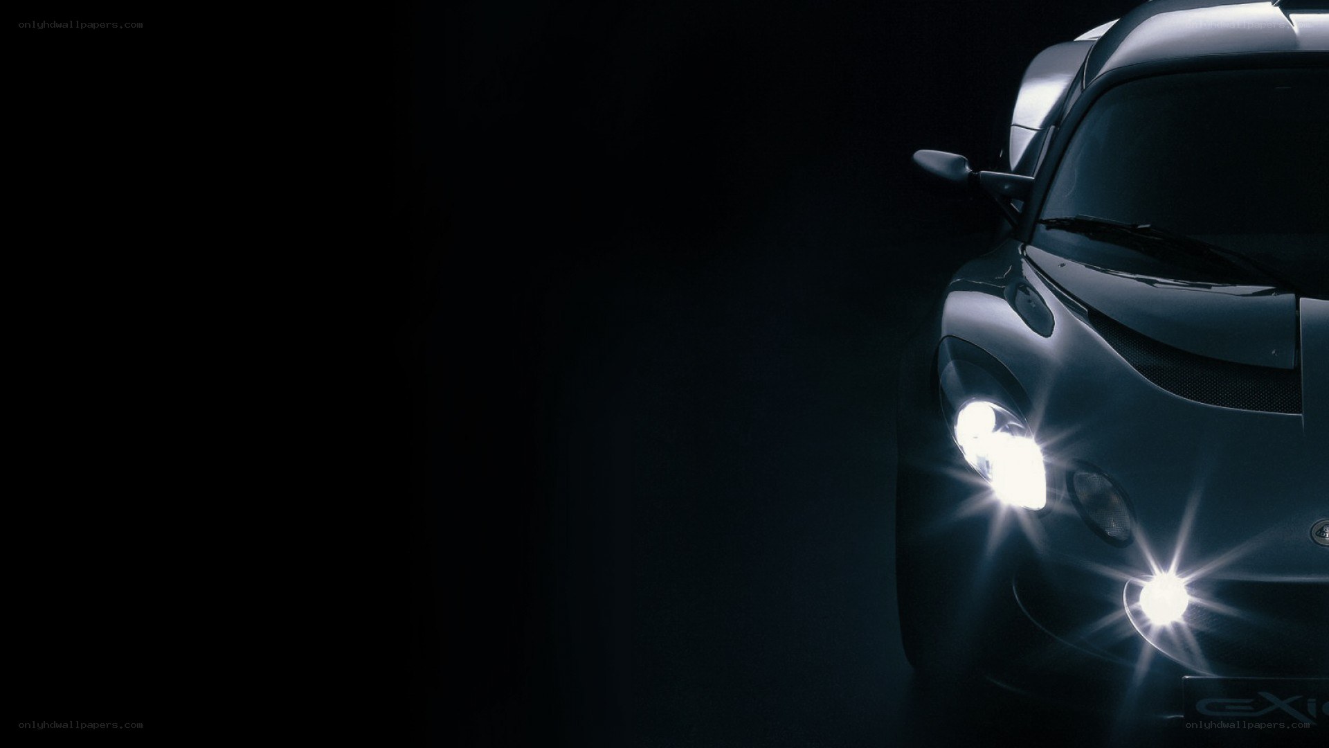 car headlights in darkness