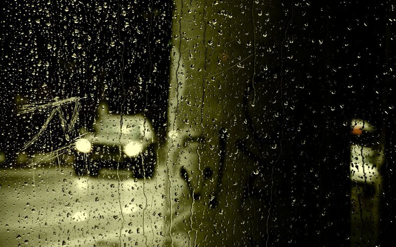 Car Headlights Through Rain