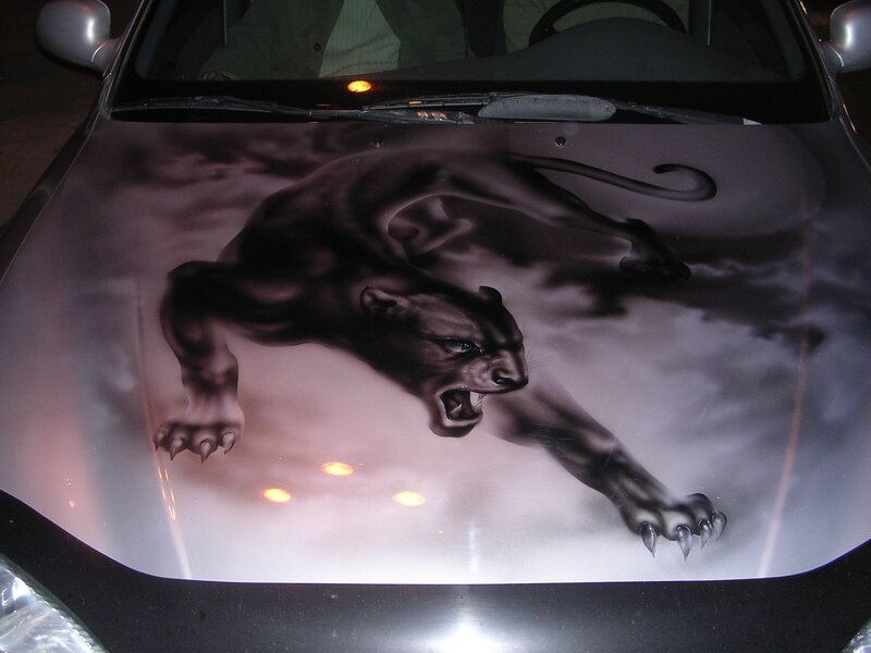 car hood with panther painting