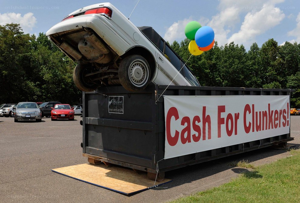 Car in a dumpster with balloons
