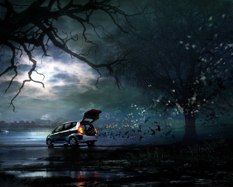 Car in a stormy landscape