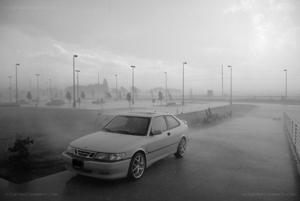 Car in a stormy parking lot