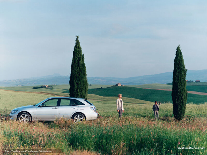 Car in a Tuscan field